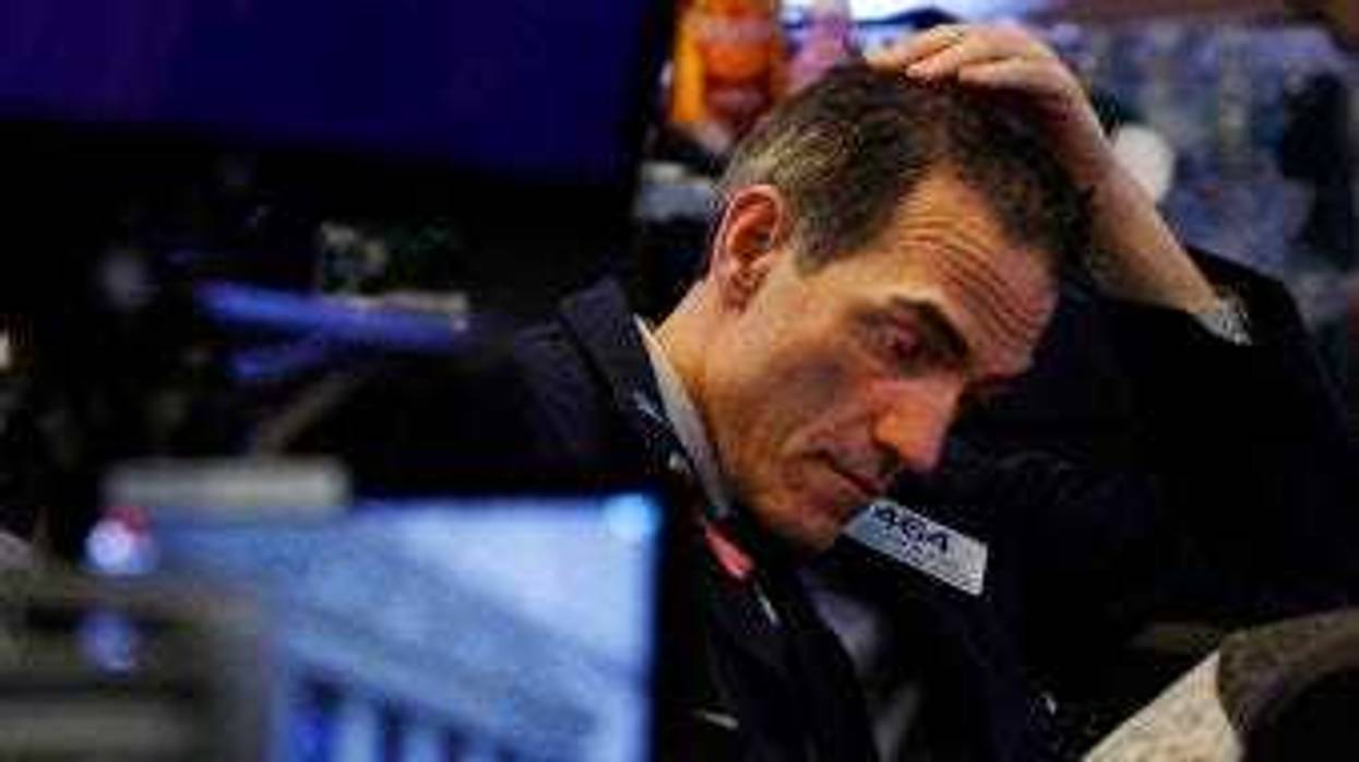 Trader Gregory Rowe prepares for the day's activity on the floor of the New York Stock Exchange, Monday, March 9, 2020. (AP Photo/Richard Drew)