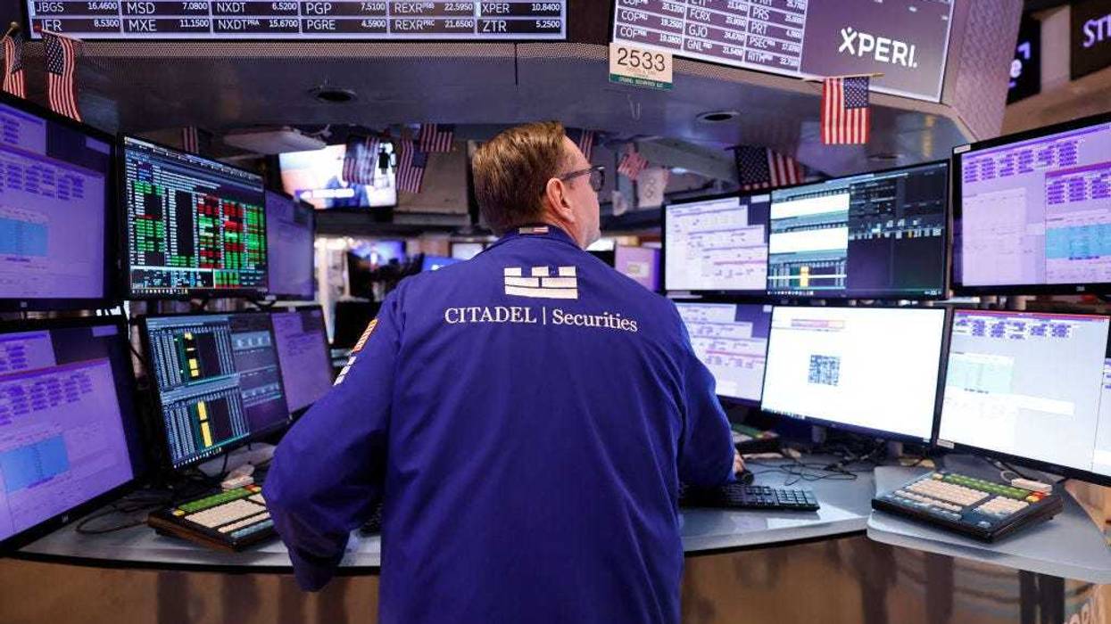 Traders work on the floor of the New York Stock Exchange during morning trading on February 23, 2024 in New York City. The market opened continuing its rise after yesterdays closing with the S&P 500, the Nasdaq Composite posting their best day since early 2023 and the Dow Jones surpassing 39,000 for the first time ever amid Nvidia reporting a stronger-than-expected quarterly results.