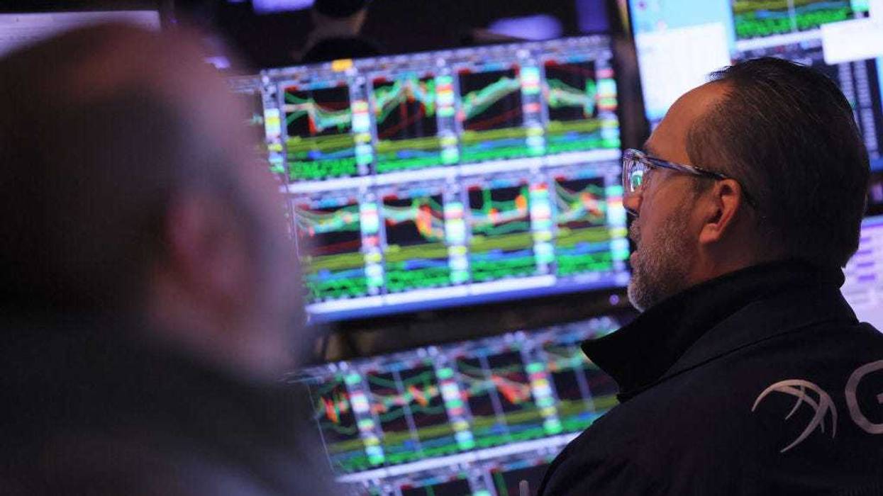 Traders work on the floor of the New York Stock Exchange during morning trading on January 17, 2023 in New York City. Stocks opened low after a holiday weekend disrupting an upswing in early 2023 momentum. Goldman Sachs reported that its quarterly profit plunged 66% from a year earlier to $1.33 billion and Morgan Stanley also reported a more than $2 billion in profit for the fourth quarter, giving the company a 40 percent decline from the previous year. (Photo by Michael M. Santiago/Getty Images)