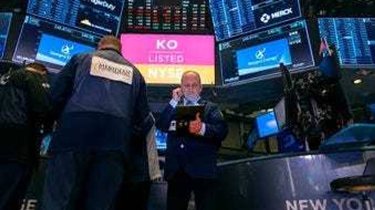 Traders work on the floor of the New York Stock Exchange Thursday, Feb. 27, 2020. (AP Photo/Craig Ruttle)