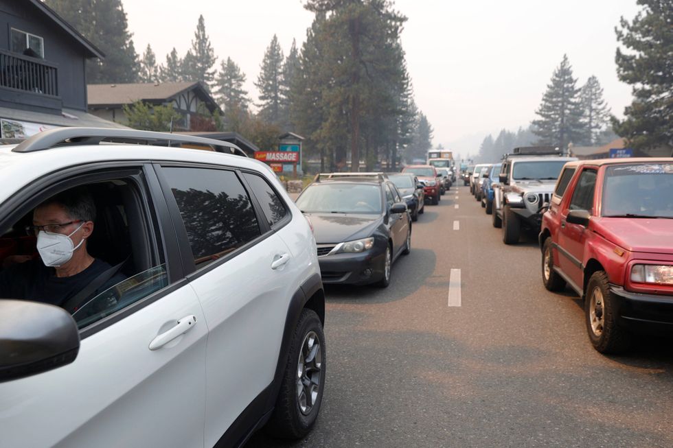 Traffic backs up on Highway 50 as people evacuate ahead of the Caldor Fire in South Lake Tahoe.