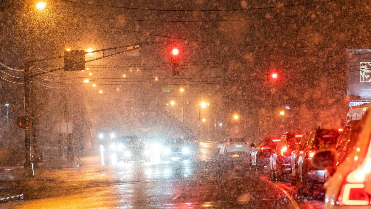 traffic Jams while snow falls during a winter storm