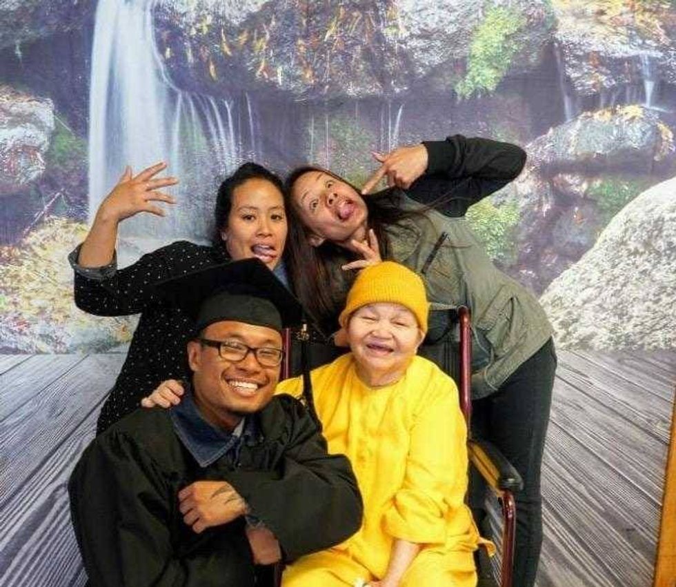 Tran and his family celebrate his associate degree.