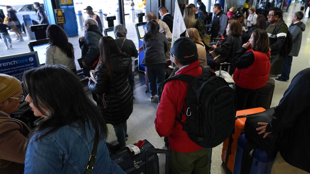 Travelers are seen at the Newark Liberty International Airport (EWR) on Nov. 26, 2024