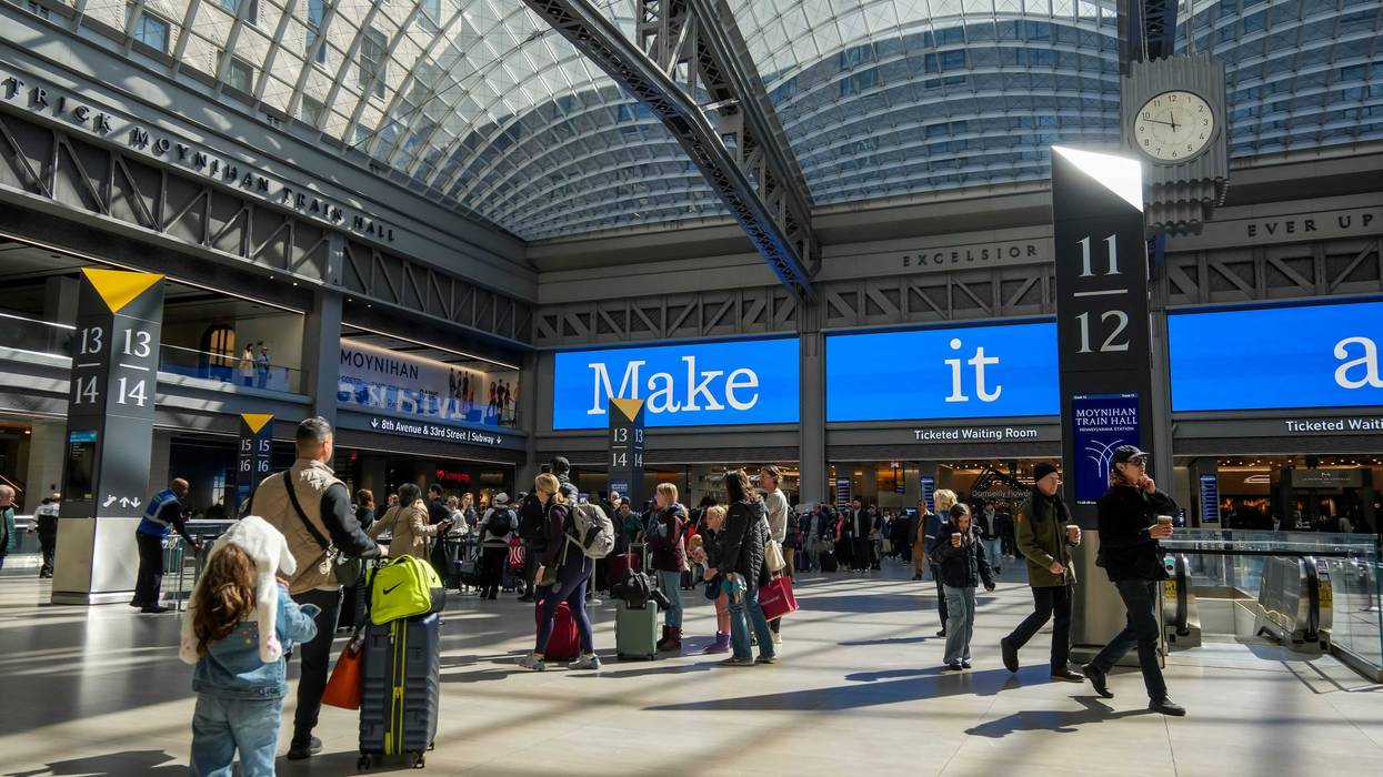 Travelers at the Moynihan Train Hall at Penn Station in New York on Sunday, March 23, 2025.
