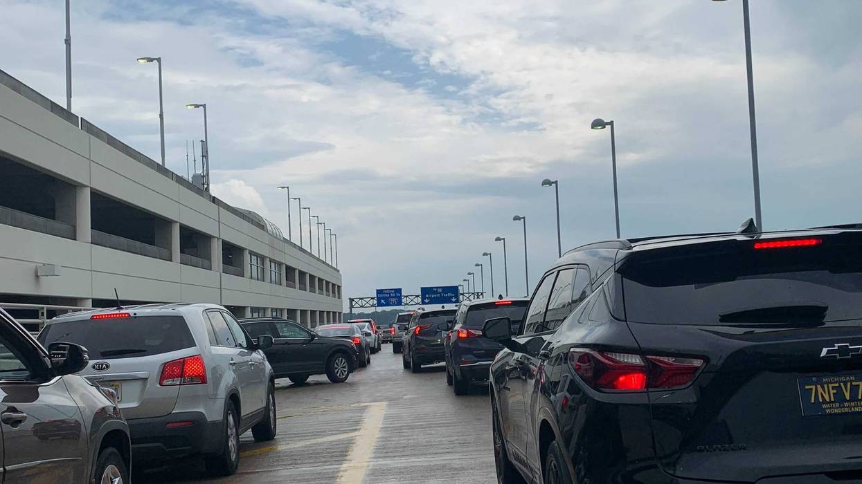 Travelers coming to and from Detroit Metro Airport are at a standstill after a bus crash snarled traffic Friday evening, WWJ's KT reports.