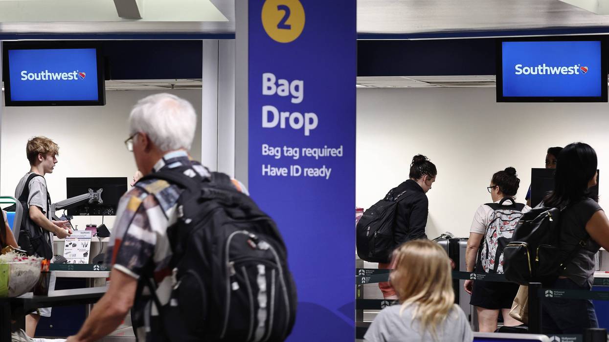 Travelers gather at the Southwest Airlines check-in area at Hollywood Burbank Airport on July 25, 2024, in Burbank, California.