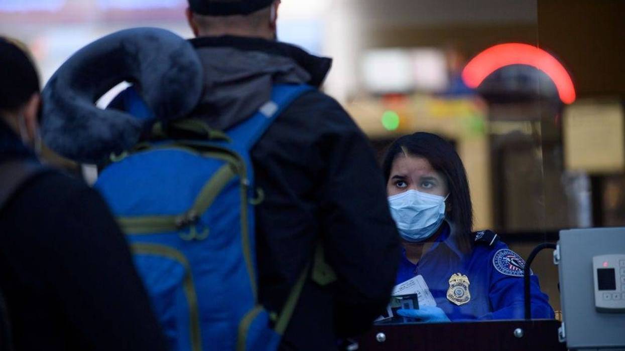 Travelers make their way through ticketing and TSA inspection as State of Pennsylvania