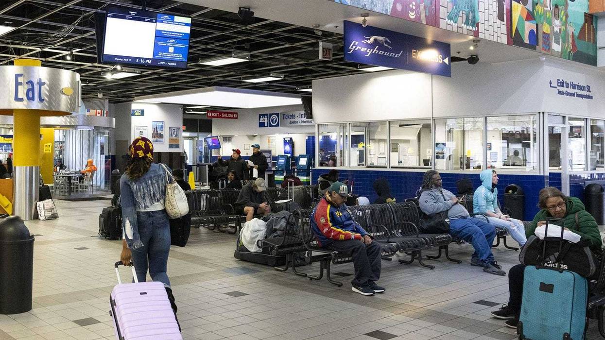 Travelers wait in the Greyhound bus station in the Near West Side neighborhood on April 17, 2023. The station is at risk of closing by October.
