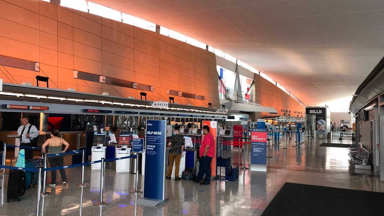 Travelers wear coronavirus masks at the Buffalo Niagara International Airport. July 1, 2020 (WBEN Photo/Mike Baggerman)