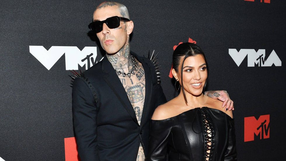 Kourtney Kardashian and Travis Barker engaged after beach proposal