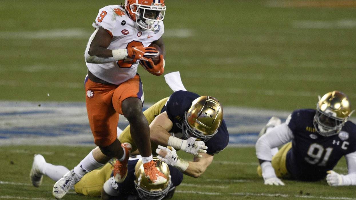 Travis Etienne running v Notre Dame