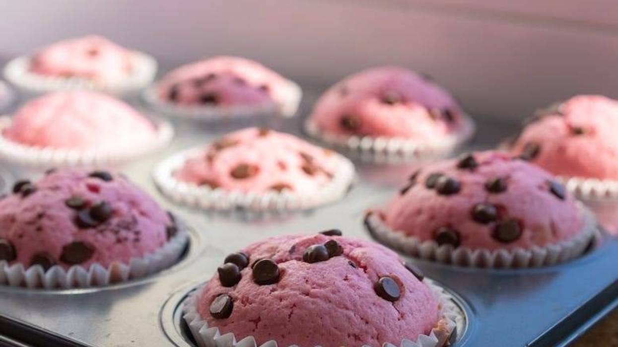 Tray of pink muffins with chocolate chips