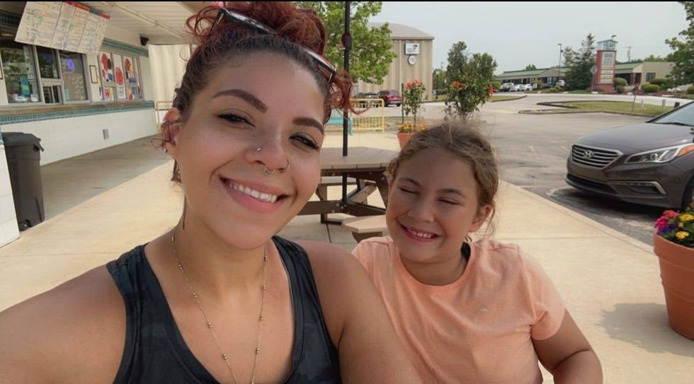 Treasure Dowell with her nine-year-old daughter