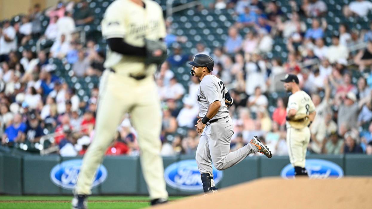 Trent Grisham #12 of the New York Yankees rounds the bases on his two-run home run against the Minnesota Twins in the second inning at Target Field on September 16, 2025 in Minneapolis, Minnesota.