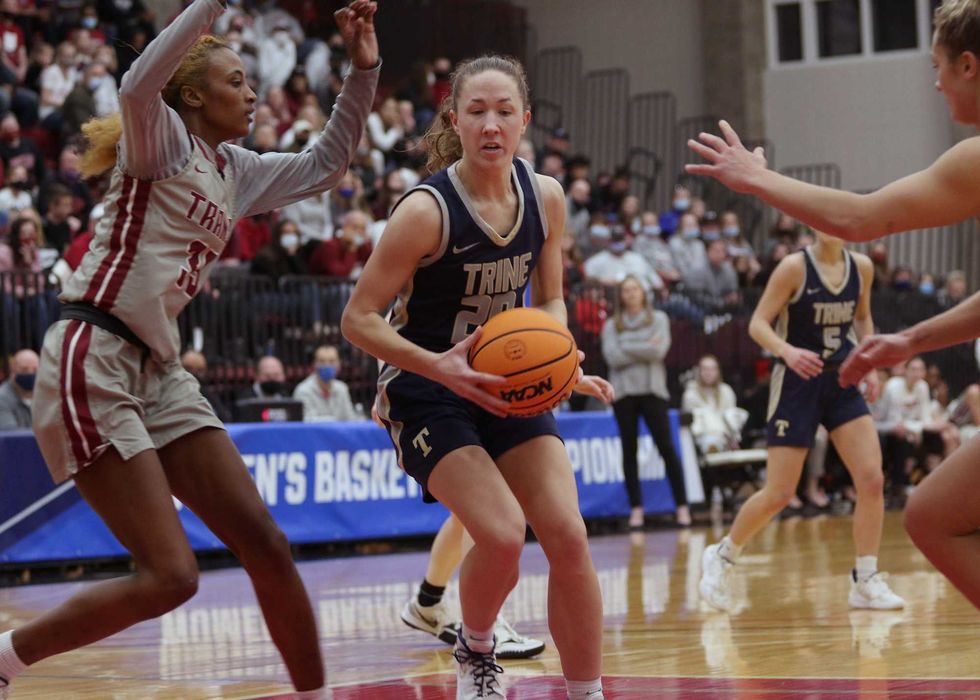 Trine player going up for layup