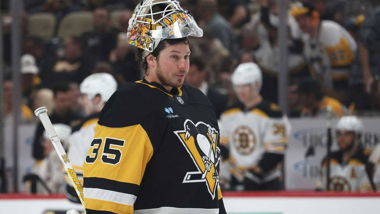 Tristan Jarry looking on ice
