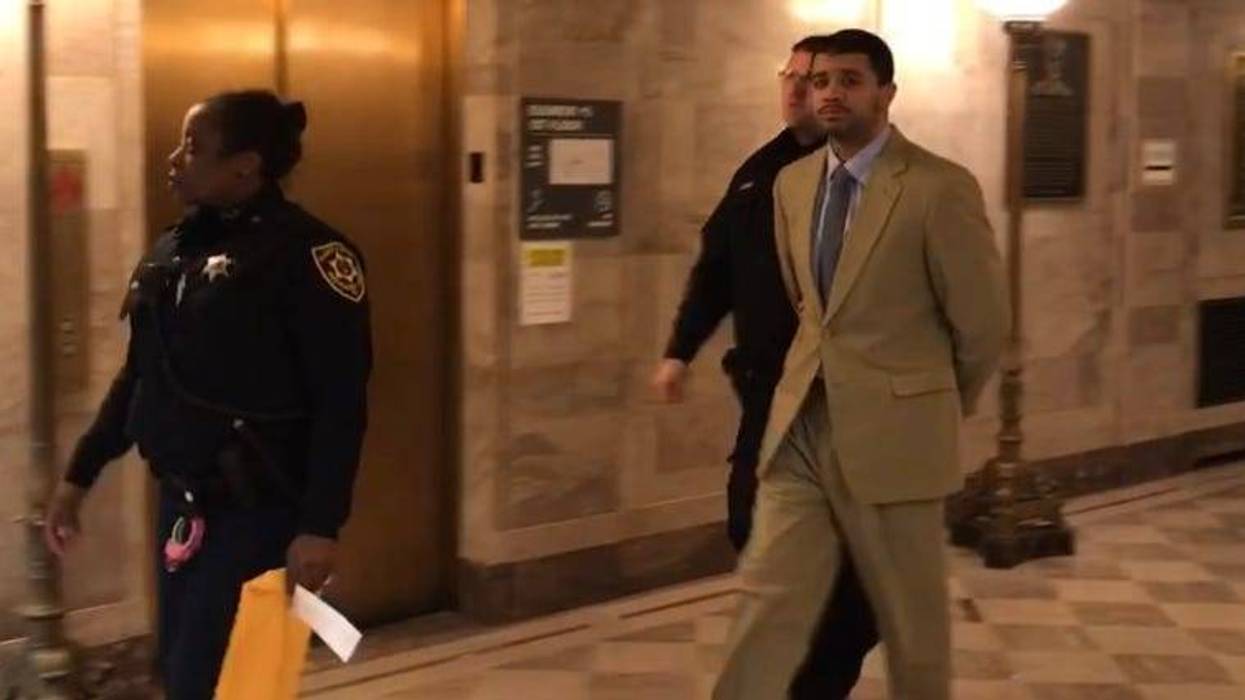 Tristian Jones (right) is escorted out of court, March 4, 2019.