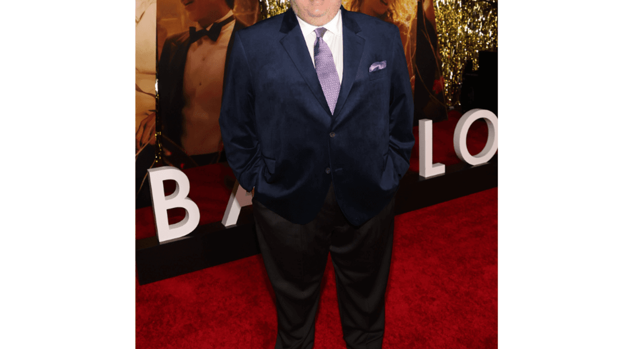 troy metcalf stands at babylon premiere
