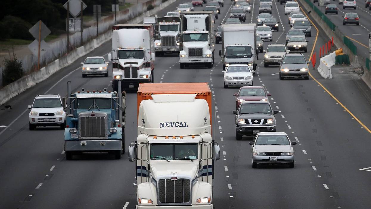 Trucks drive along Interstate 80 on February 18, 2014 in Berkeley, California.