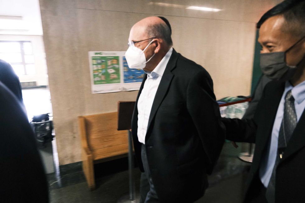 Trump Organization finance chief Allen Weisselberg appears in a New York court after turning himself into authorities on July 01, 2021 in New York City. According to reports, federal prosecutors with the Manhattan district attorney