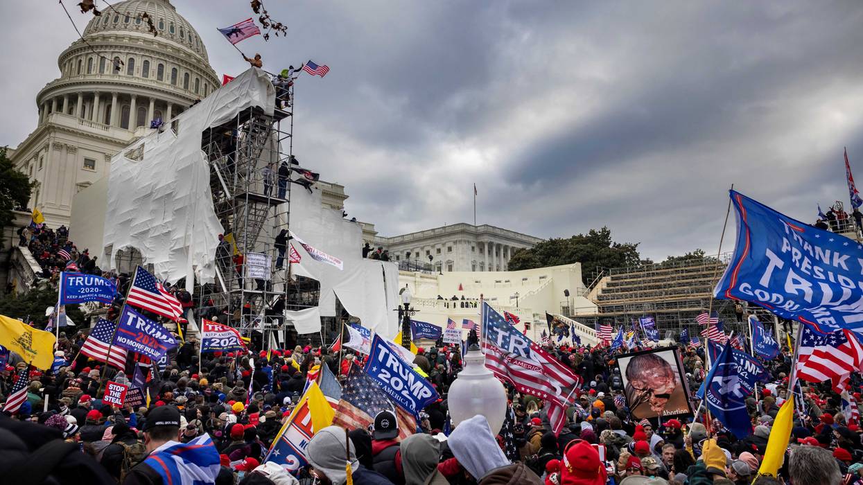 Trump supporters clash with police and security forces as people try to storm the US Capitol on January 6, 2021 in Washington, DC