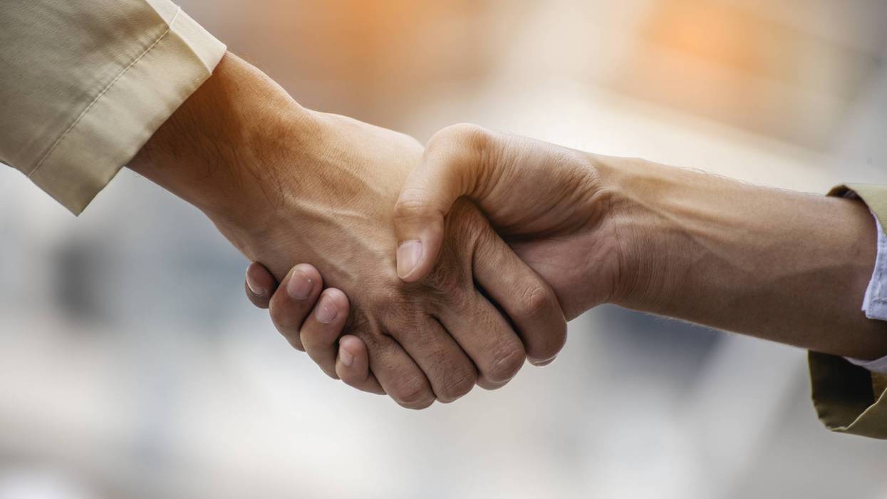 Trust honesty business customer handshake together promise respect partner. Businessman diversity solidarity team multiethnic Partner hands together teamwork. Multiracial meeting shaking hands concept