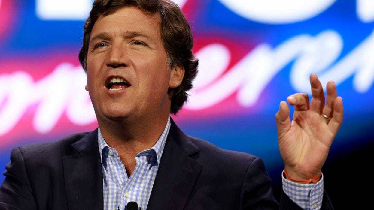 Tucker Carlson speaks at the Turning Point Action conference on July 15, 2023 in West Palm Beach, Florida. Trump is scheduled to speak at the event held in the Palm Beach County Convention Center.