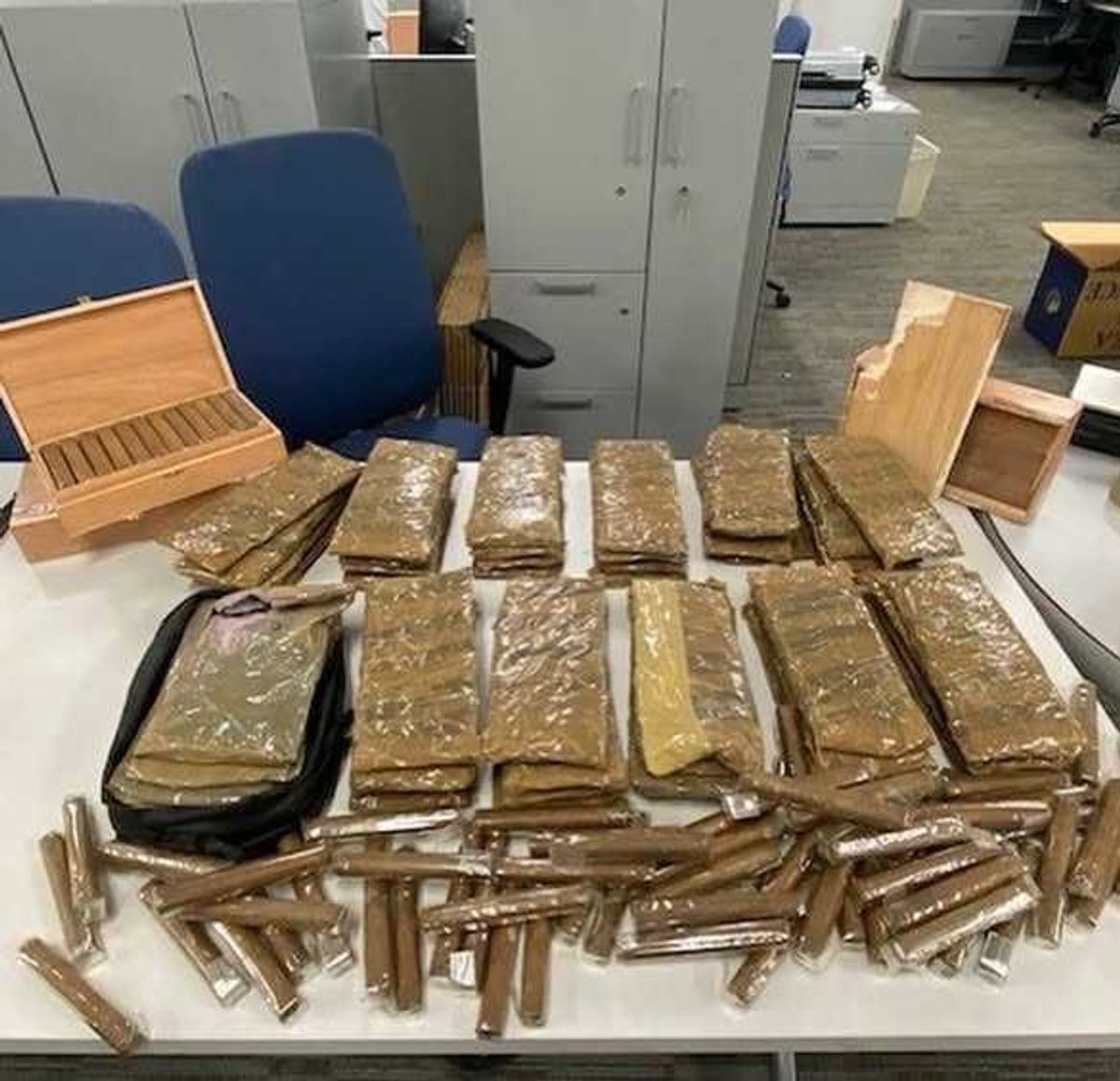 Twenty Pounds of Cocaine Concealed in Dozens of Cigar Boxes; Two Men Indicted for Narcotics Possession