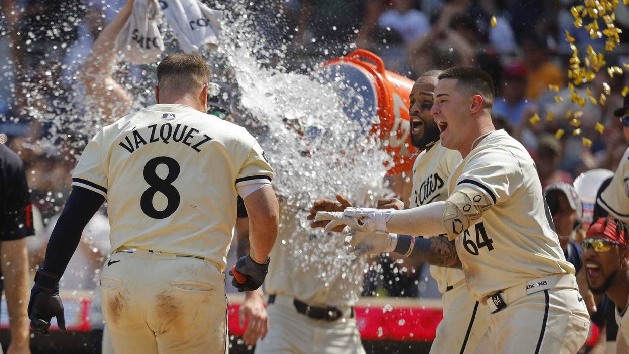Twins catcher Christian Vazquez (8) celebrates a game-winning home run against the Houston Astros with second baseman Willi Castro (50) and third baseman Jose Miranda (64) in the ninth inning at Target Field.