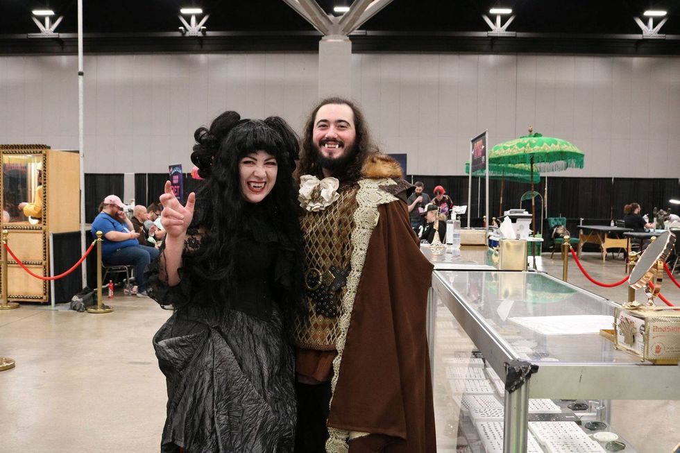 Two attendees at GalaxyCon in vampire cosplay.