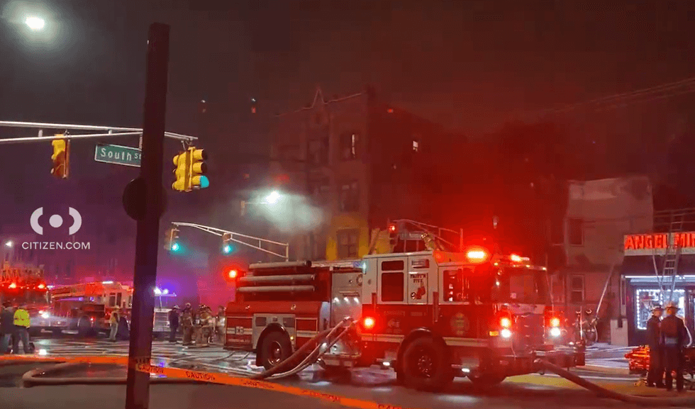 Two firefighters were injured and 26 people were displaced as a result of the fire in Jersey City, officials said.
