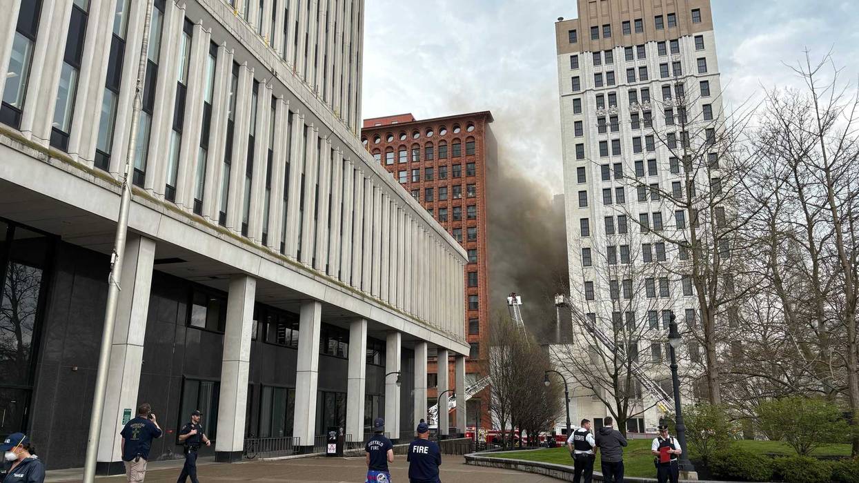 Two historic buildings on each side of the downtown law firm that caught fire Thursday were spared exposure damage.