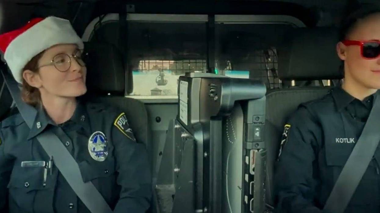 Two Irving officers spread "a little Christmas cheer" by lip-synching to Christmas songs