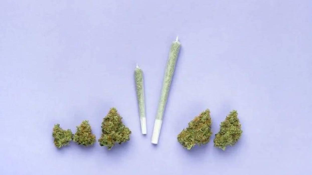 Two joints and dry buds of marijuana.