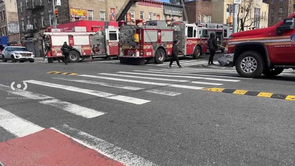 Two men, ages 43 and 35, were injured when the crane struck their vehicle.