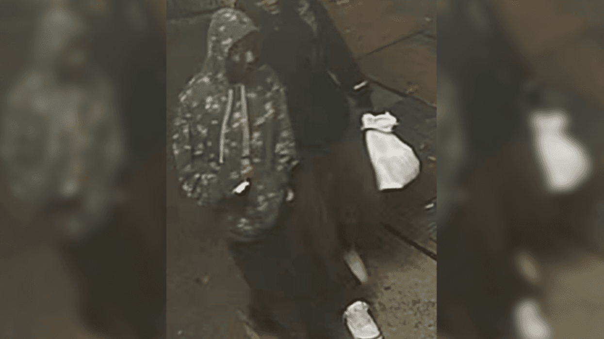 Two men are being sought in relation to a robbery on a subway platform.