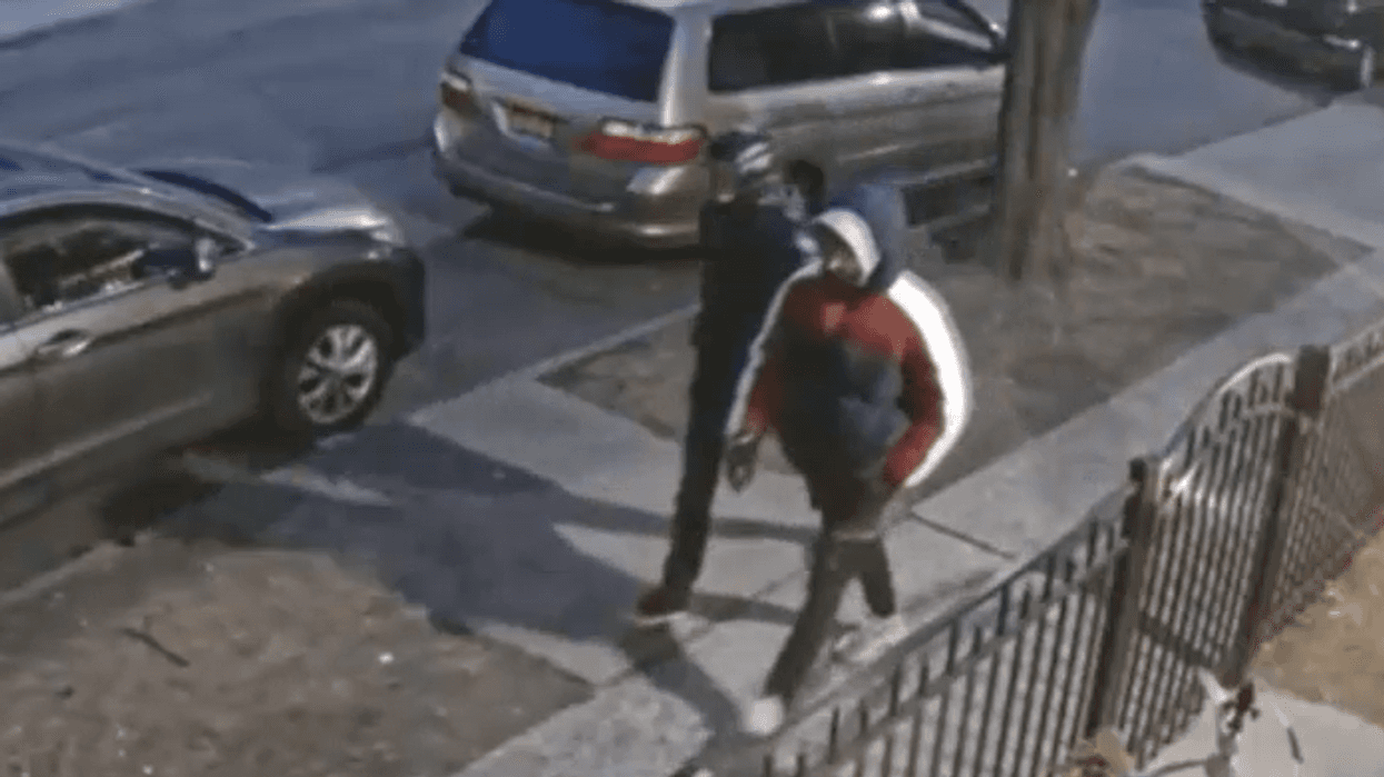 Two men are wanted for stabbing a woman, 68, in a Queens home invasion.