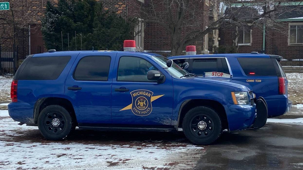 Two Michigan State Police SUVs