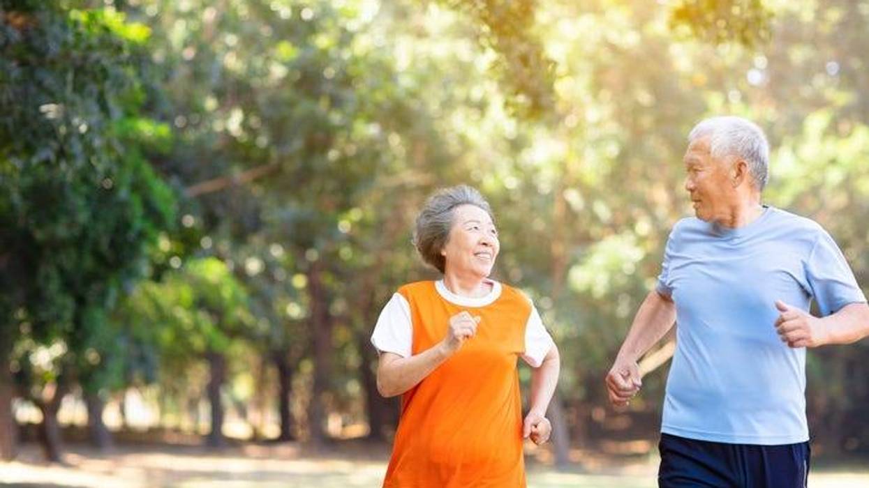Two people exercising.