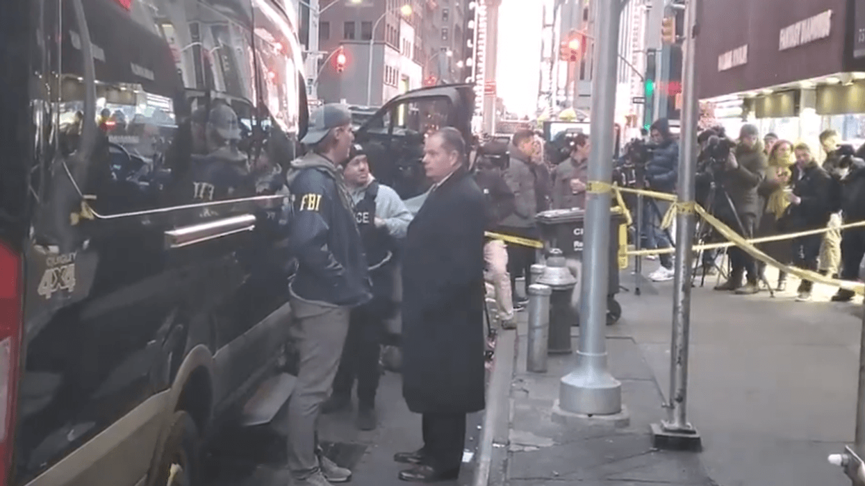 Two people were arrested in the Diamond District on Tuesday in association with a national fencing operation, the Department of Justice said.