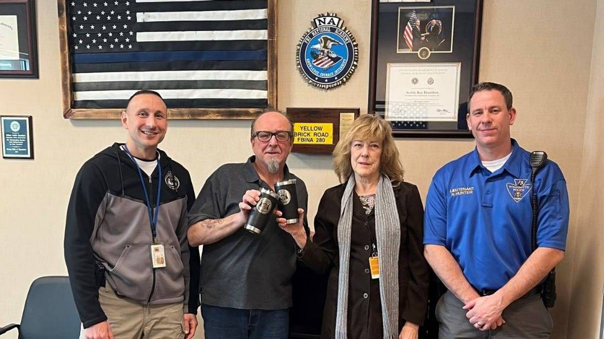 Two residents are being praised for their heroic actions after they were able to disarm a gunman at a Downriver Tim Horton's last week, officials announced.