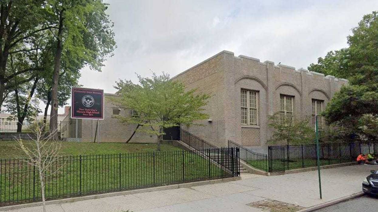 Two students were arrested on Thursday for bringing guns into Flushing High School, adding to a disturbing trend of guns in and around NYC public schools this week.