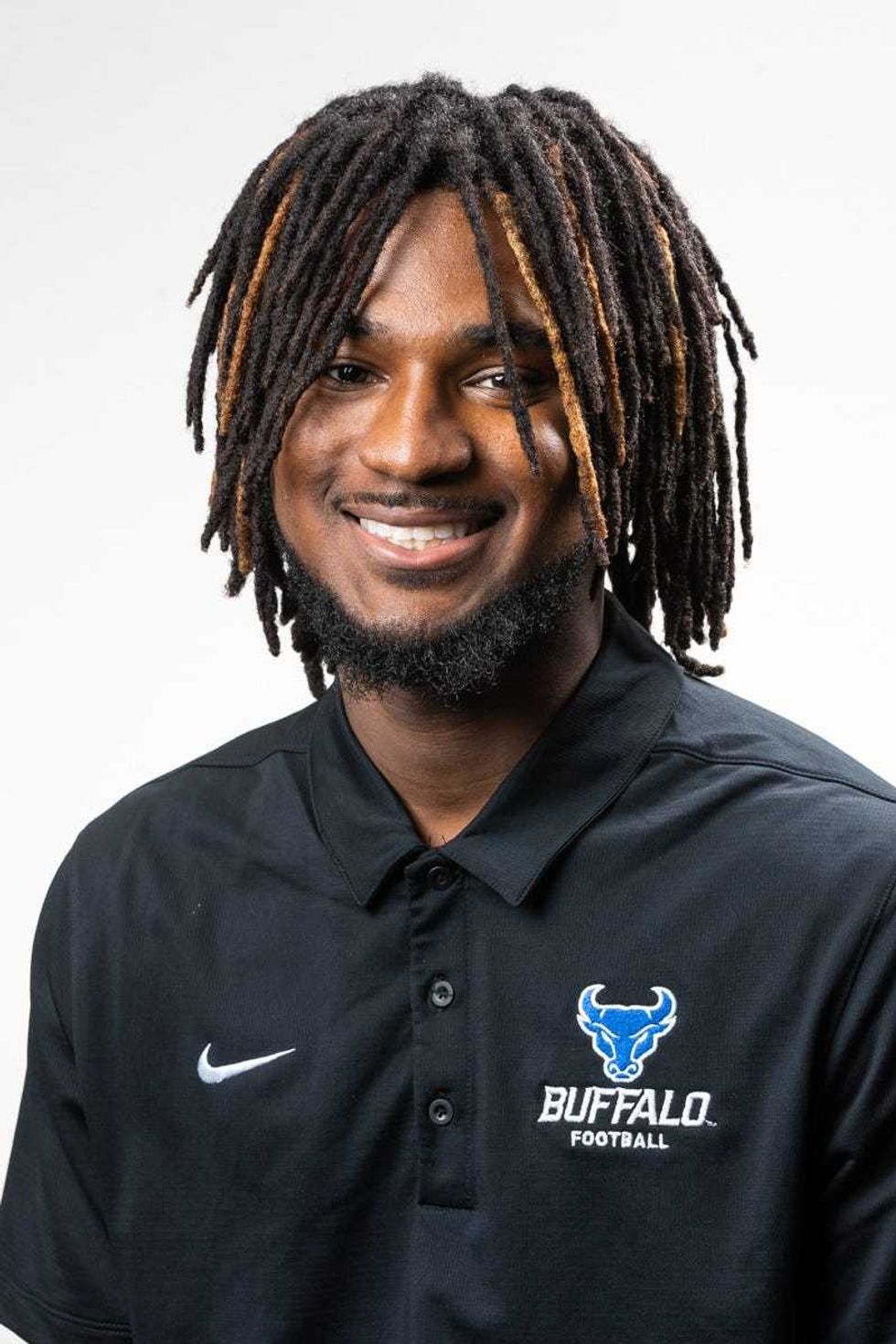 Two UB football players have been dismissed from the program following allegations they beat a dog with a belt in an apartment in Amherst two weeks ago. They were arraigned in Amherst Town Court Thursday.