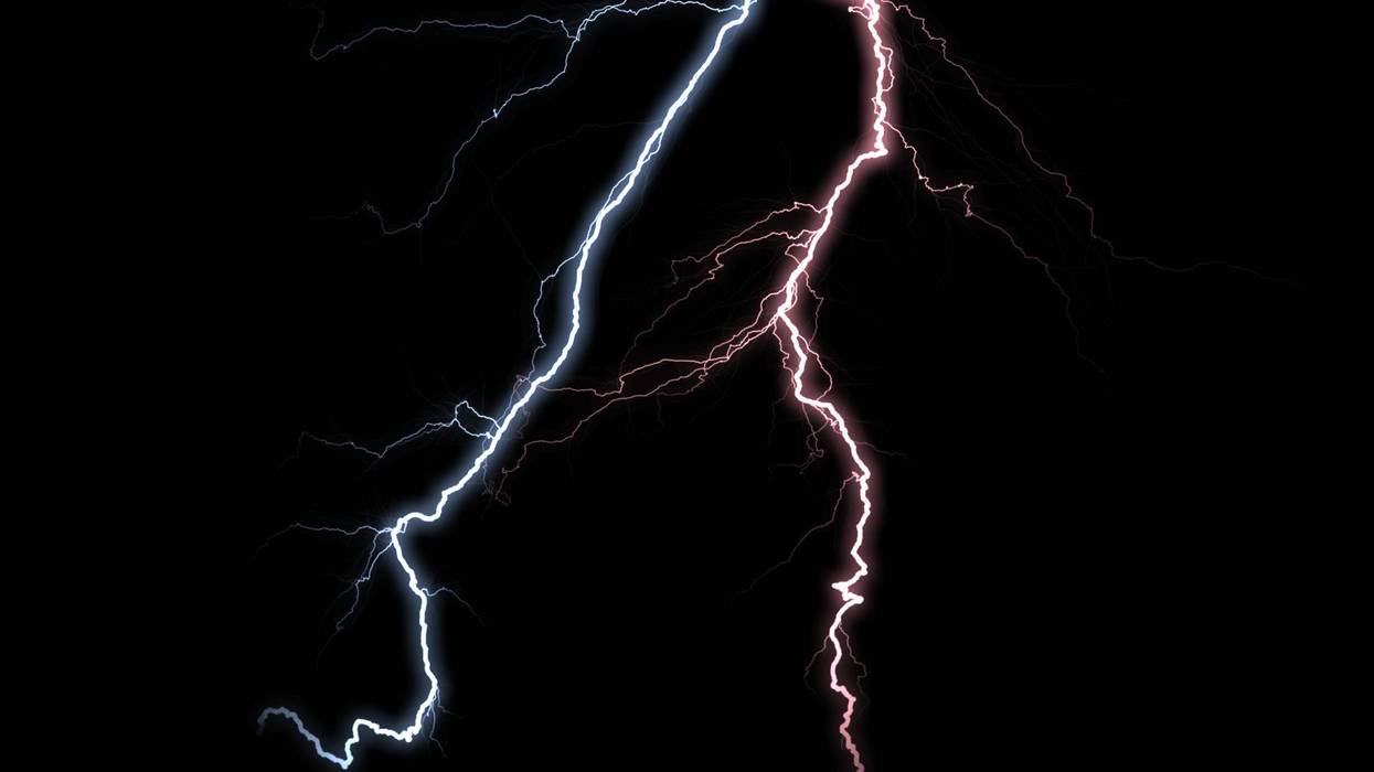 Two vibrant lightning bolts, one blue and one red, crackle with intense energy, dramatically illuminating the stark black void.