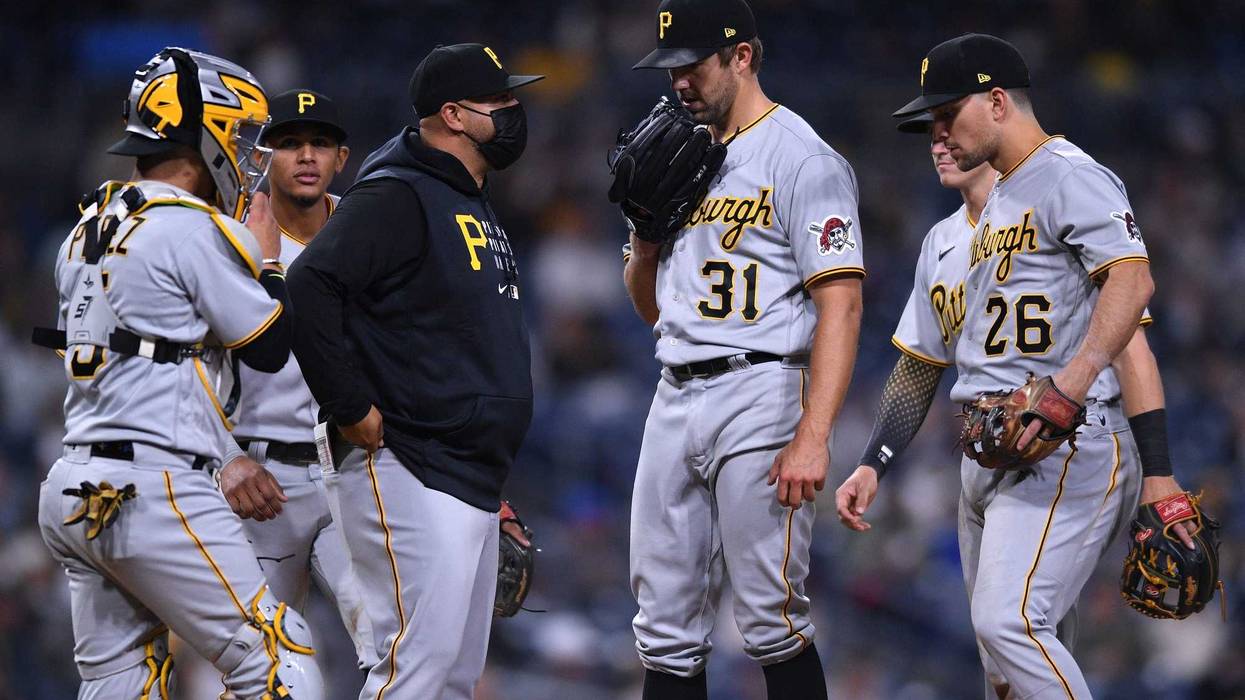 Tyler Anderson during meeting on the mound
