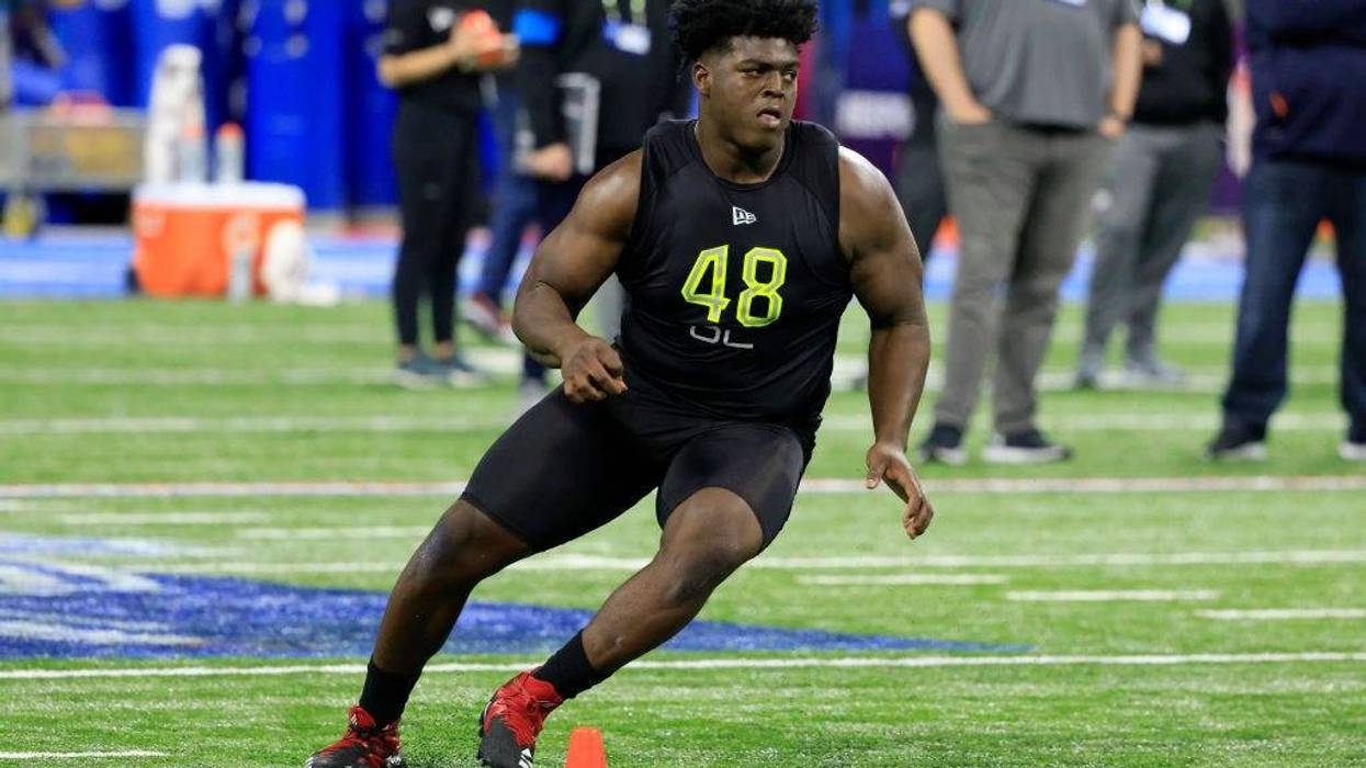 Tyler Smith #OL48 of Tulsa runs a drill during the NFL Combine at Lucas Oil Stadium on March 04, 2022 in Indianapolis, Indiana.