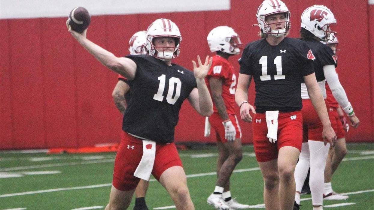 Tyler Van Dyke throws a pass during spring practice at the McClain Center in Madison