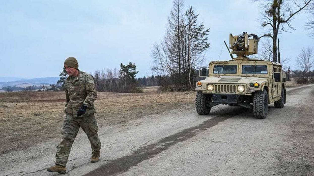 U.S. Army Humvees assigned to the 82nd Airborne arrive at the operating base at the Arlamow Airport on , 2022 in Wola Korzeniecka, Poland.