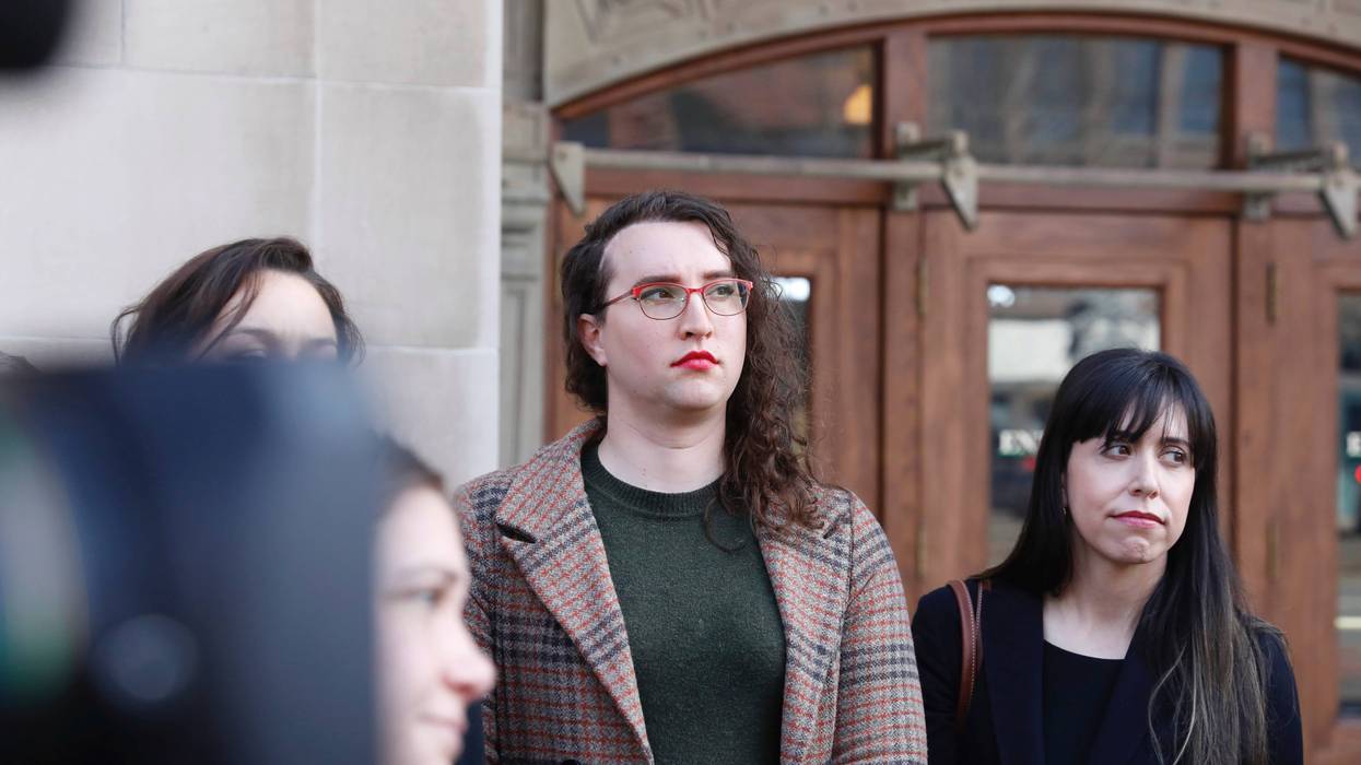 U.S. Army Sgt. 1st Class Sierra Moran, a transgender service member, listens during a press conference in Tacoma, Wash., on Tuesday, March 25, 2025.